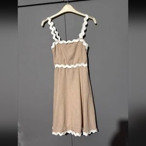 Chic Tan Dress with White Trim